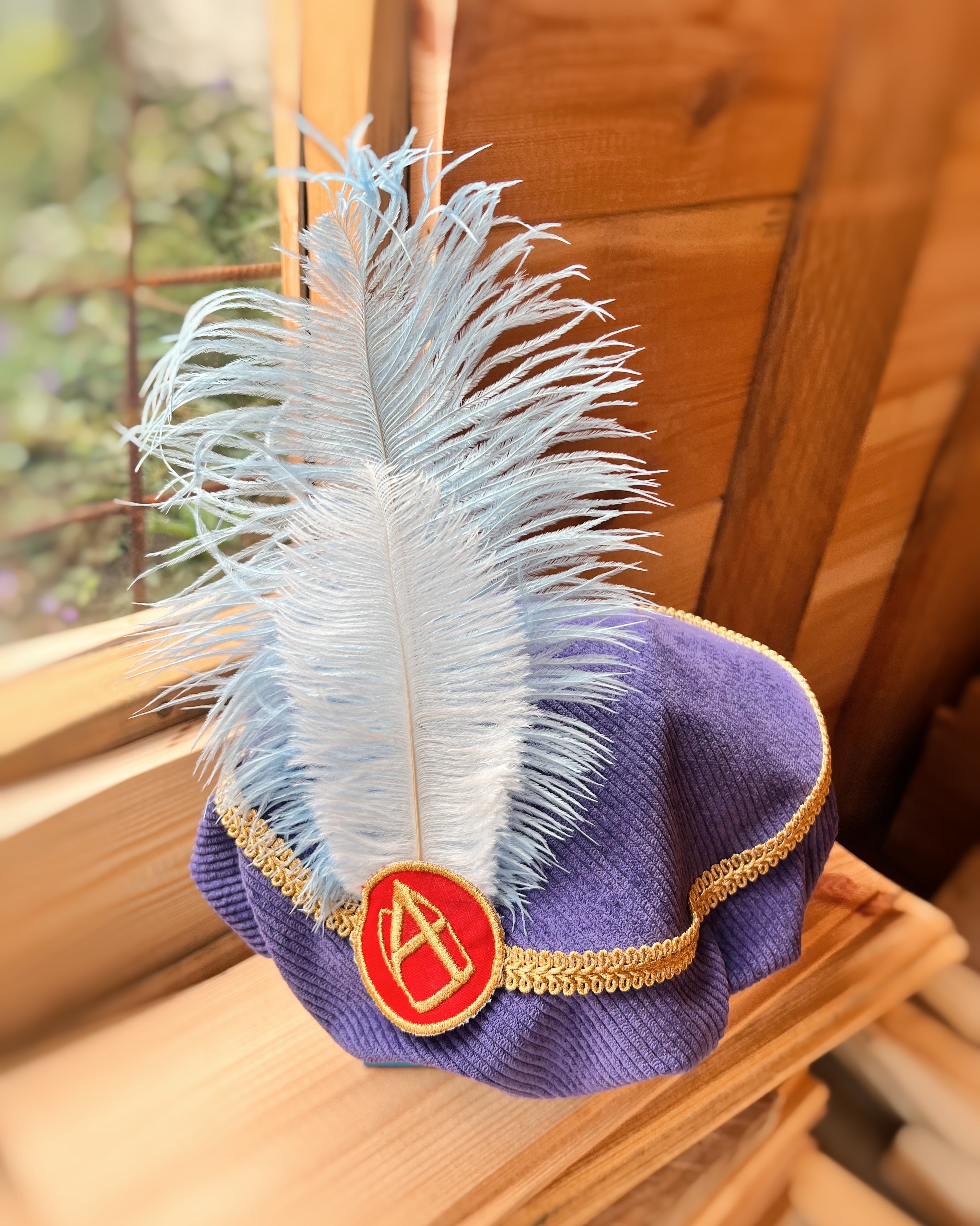 Kleurrijke Pietenmuts Paars met Sint logo personaliseerbaar