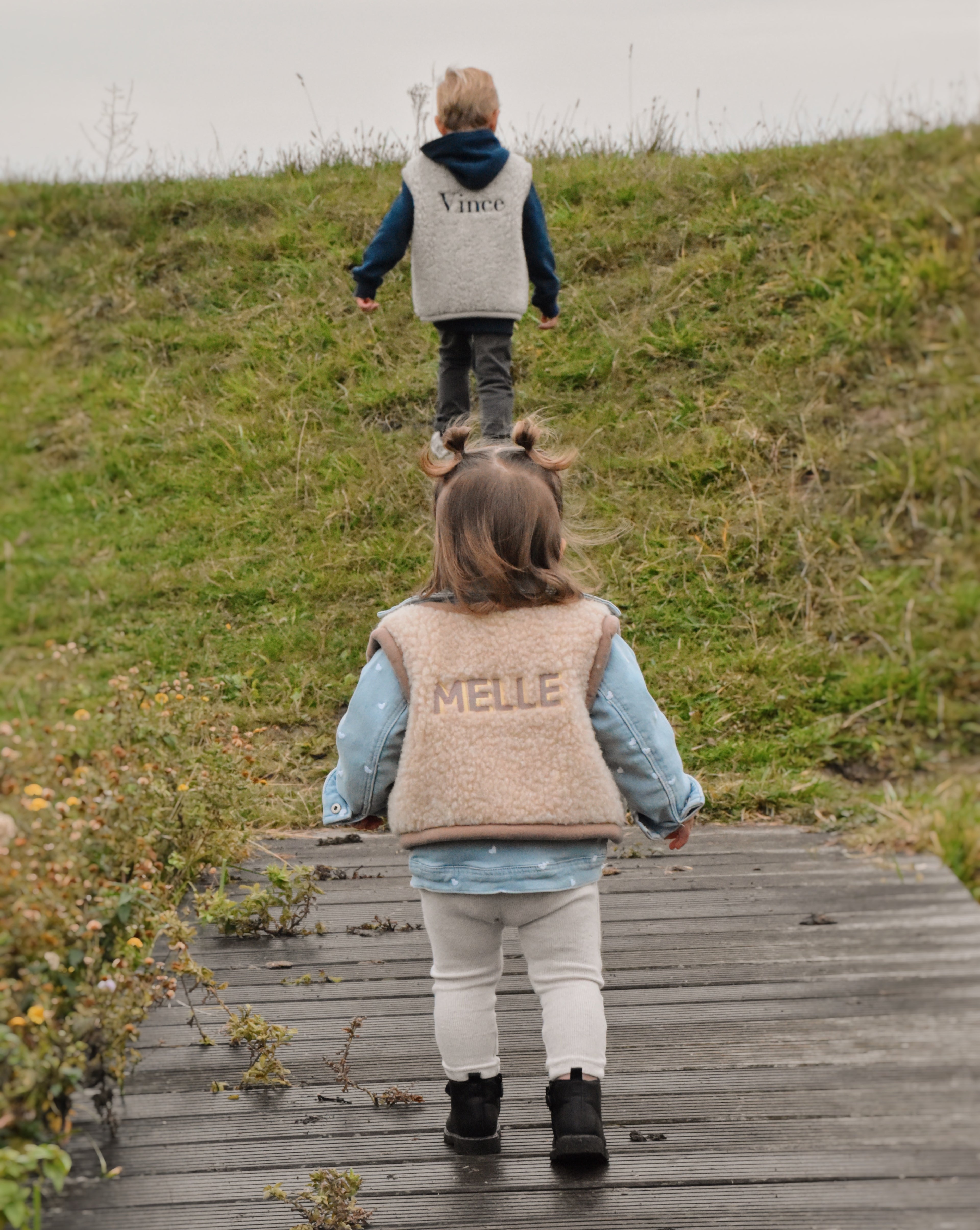 Wollen baby- en kinderbodywarmer met naam