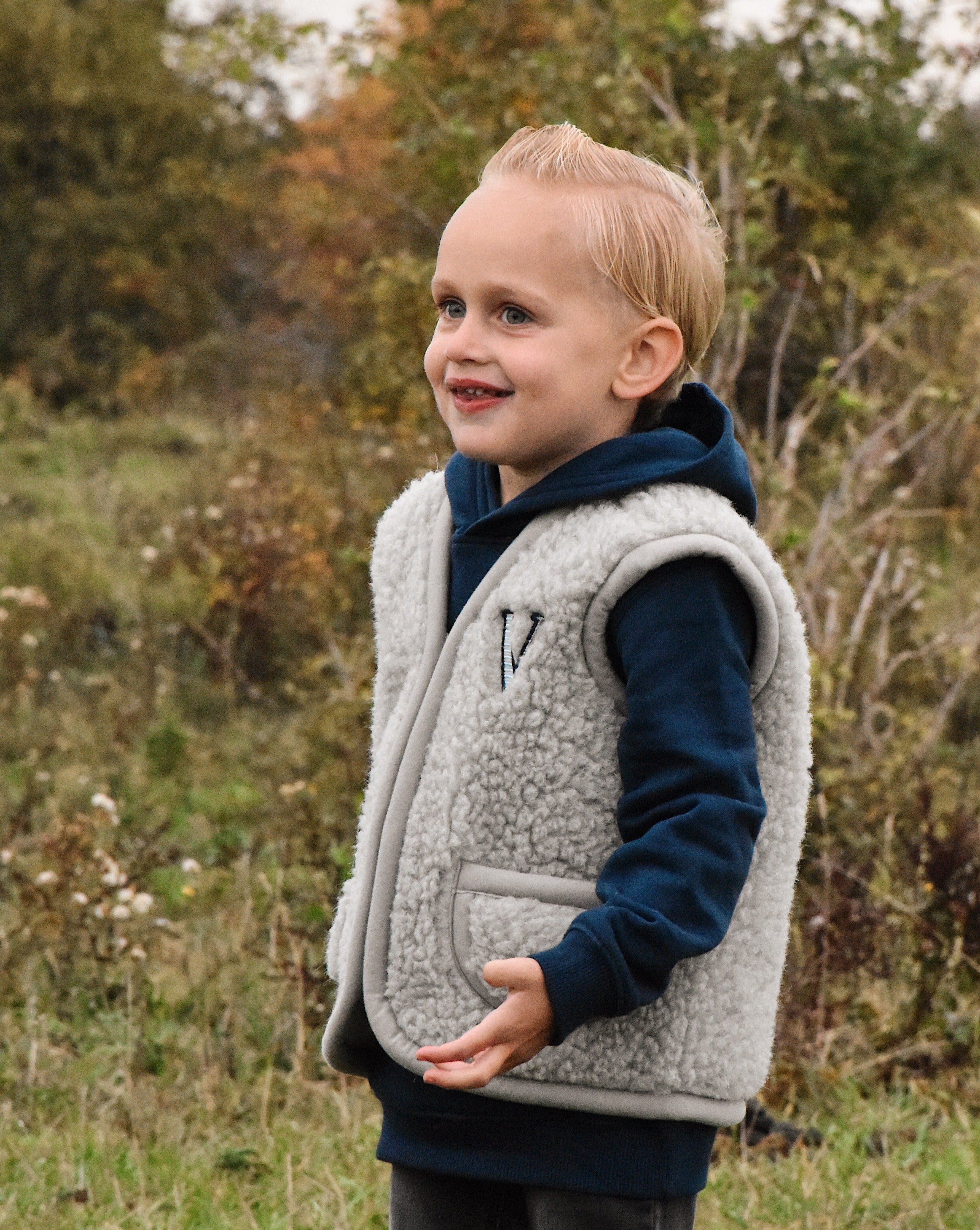 Wollen baby- en kinderbodywarmer met naam